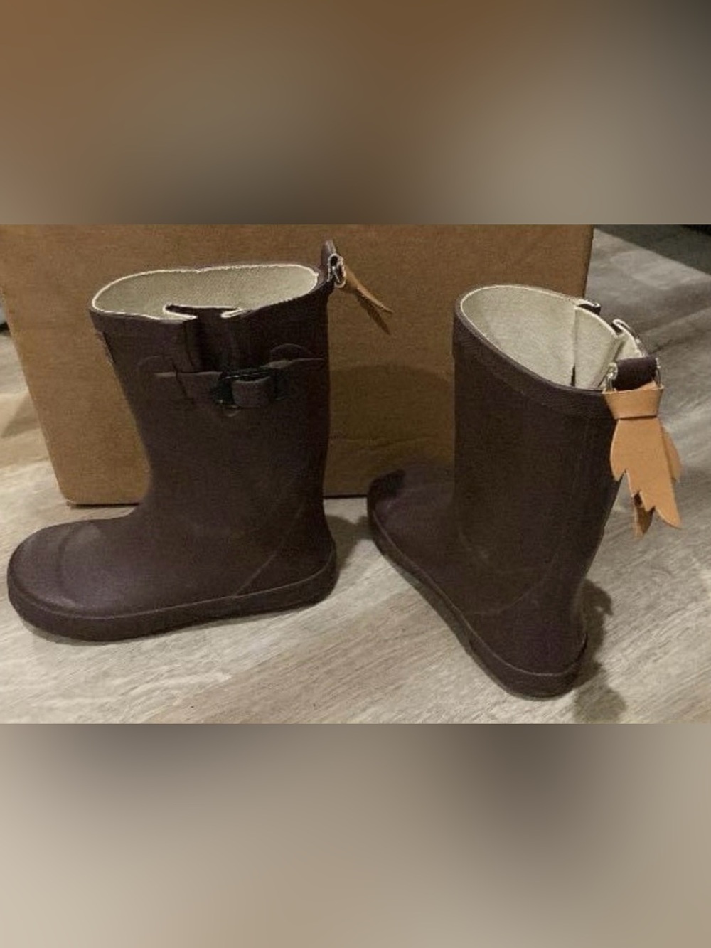 1000 Hours Outside rain boots. Size 2. Needs glue where exterior separated